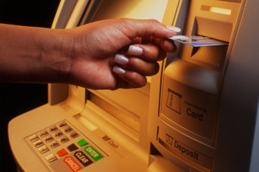 ATM (placing card in machine)